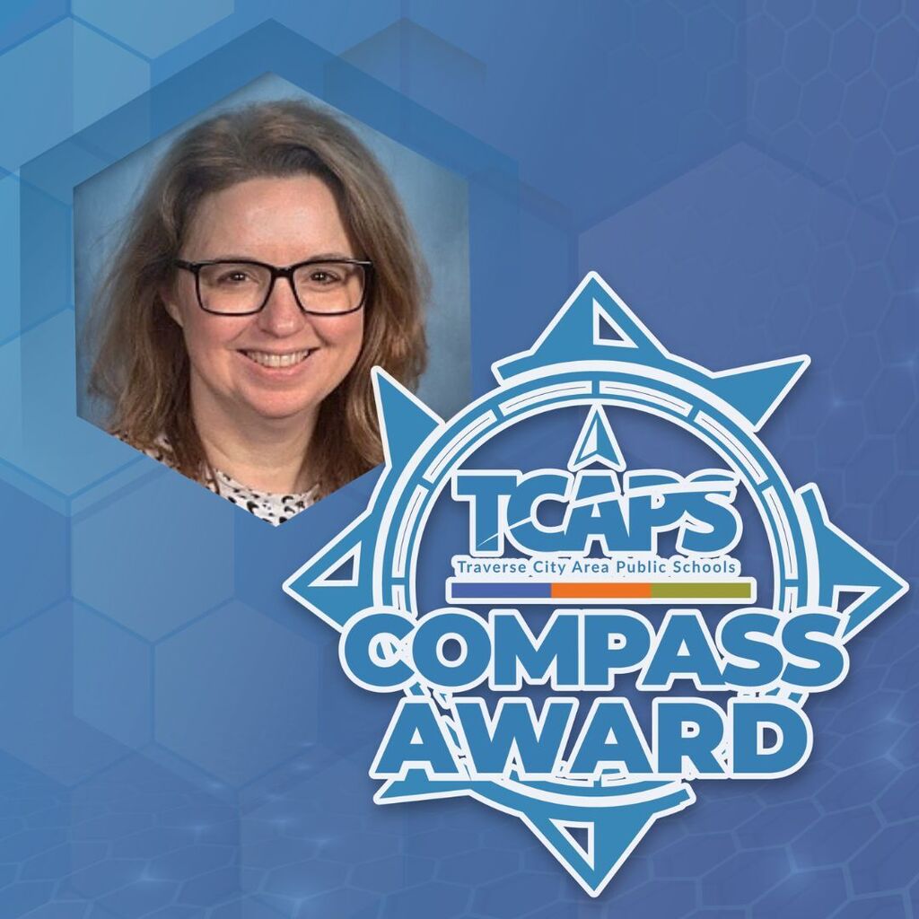 A smiling woman with glasses in a hexagon cutout, with a blue background and a "TCAPS Compass Award" logo.