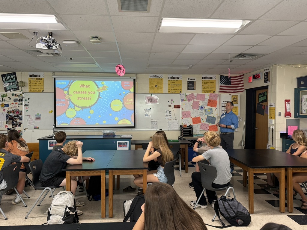 Munson Hospital staff presenting in 8th grade science classroom.