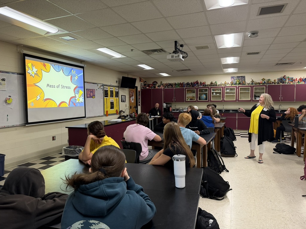 Munson Hospital staff presenting in 8th grade science classroom.