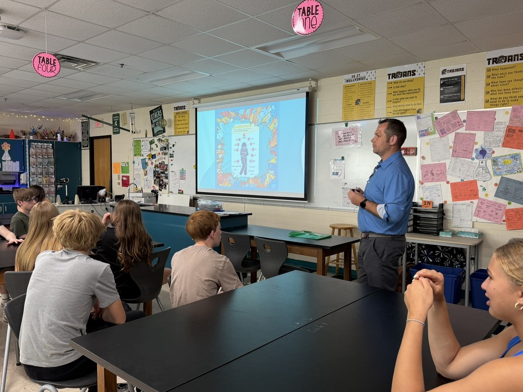 Munson Hospital staff presenting in 8th grade science classroom.
