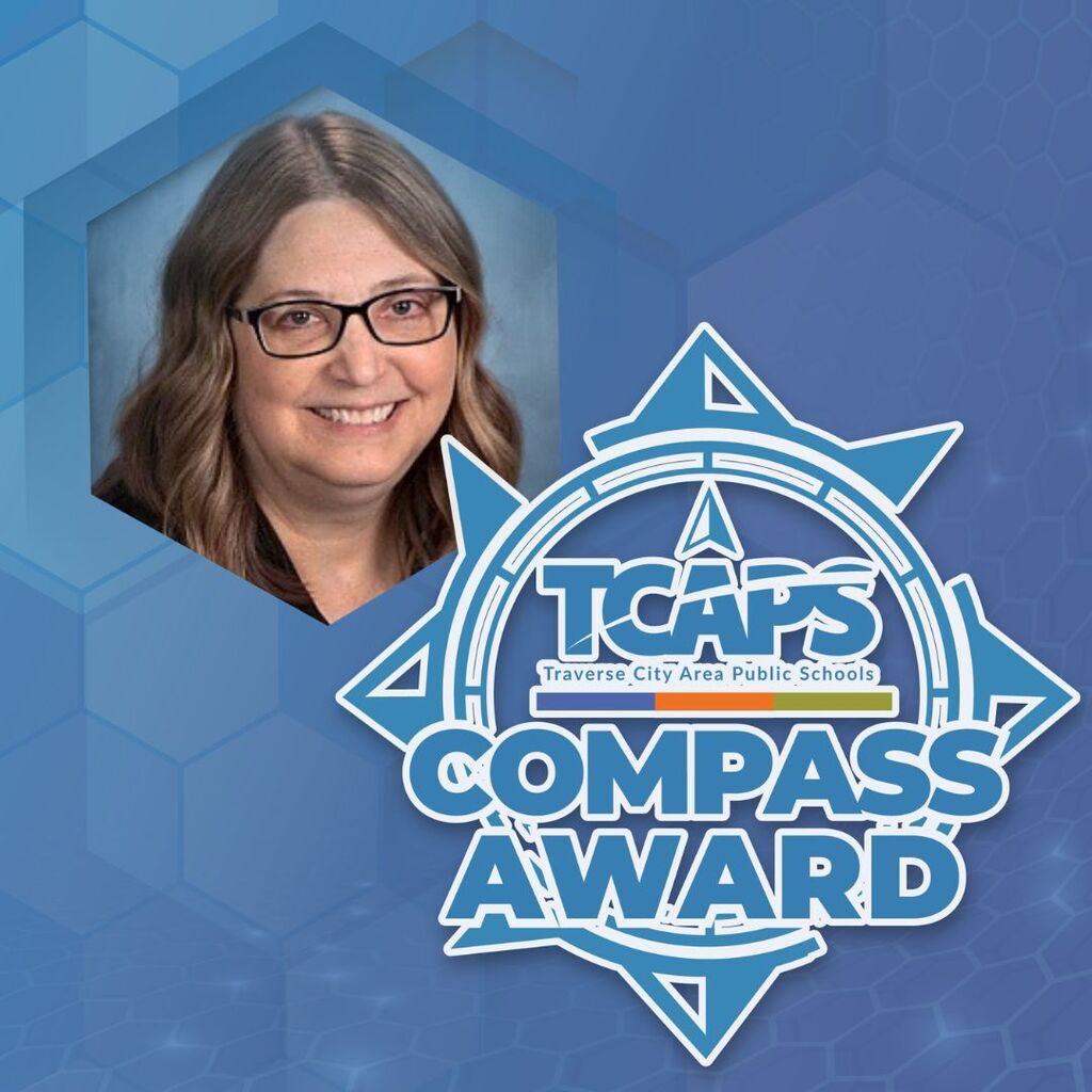 Woman with glasses on blue background with hexagons. Text: "TCAP's Compass Award" in center.