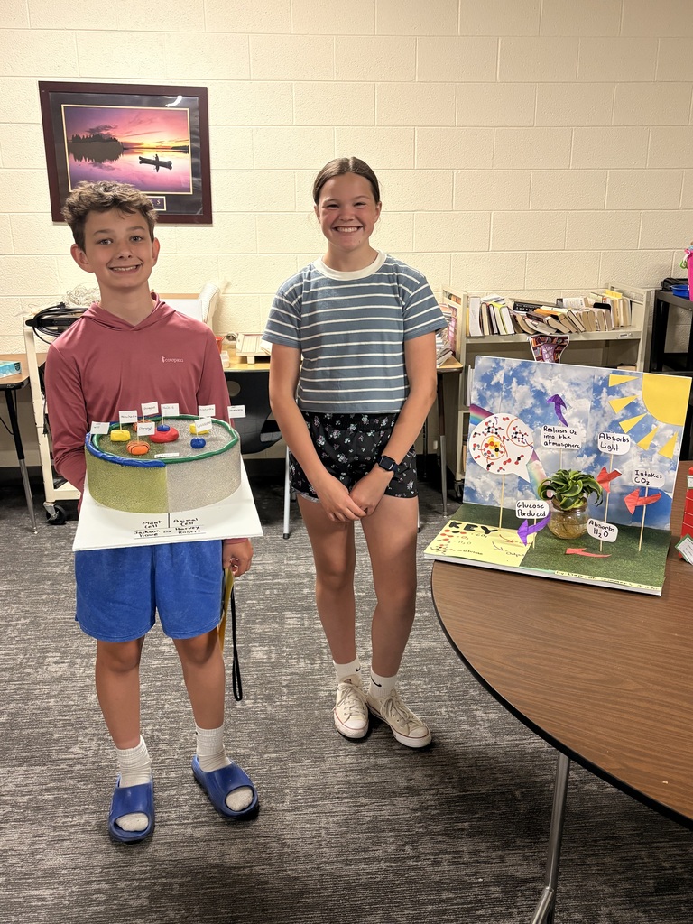 7th grade honors science students with their completed honors projects.