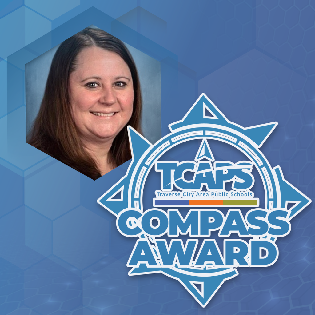 A woman with brown hair, smiling, on blue hexagons, with the logo "TCAPS Compass Award" in blue.