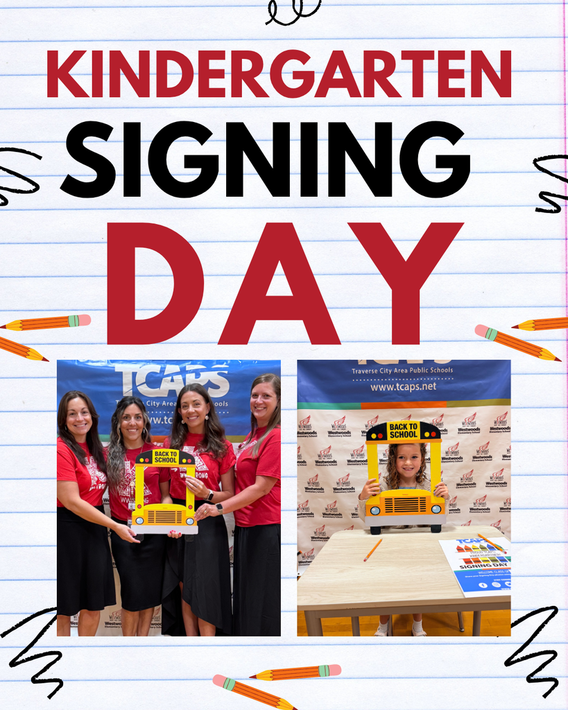A kindergarten signing day event. A group of adults in red shirts holding a yellow bus sign. A table with a pencil and a blue bus picture.