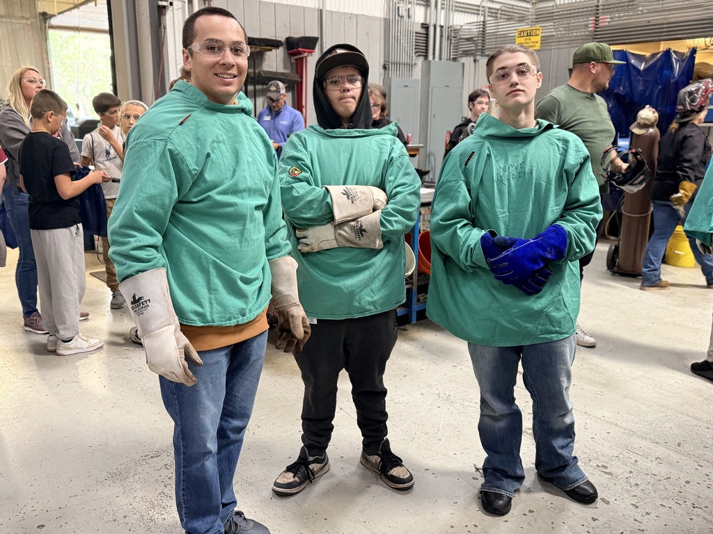 TCHS students wear work clothing at Building Tomorrow event 