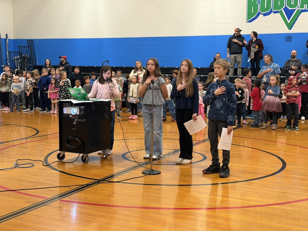 Students saying the pledge of allegiance.