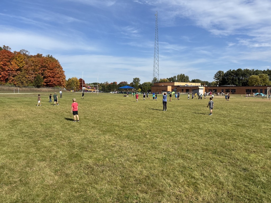Kids playing outside at recess.