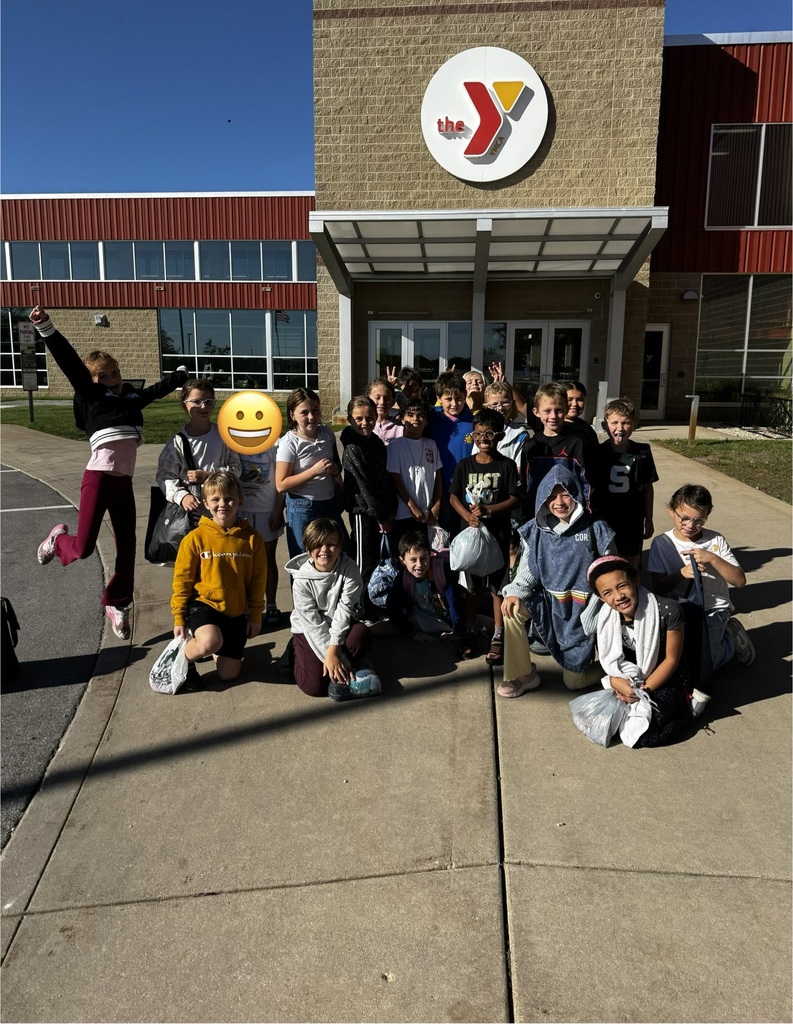 Eastern students standing in front of the YMCA Building.