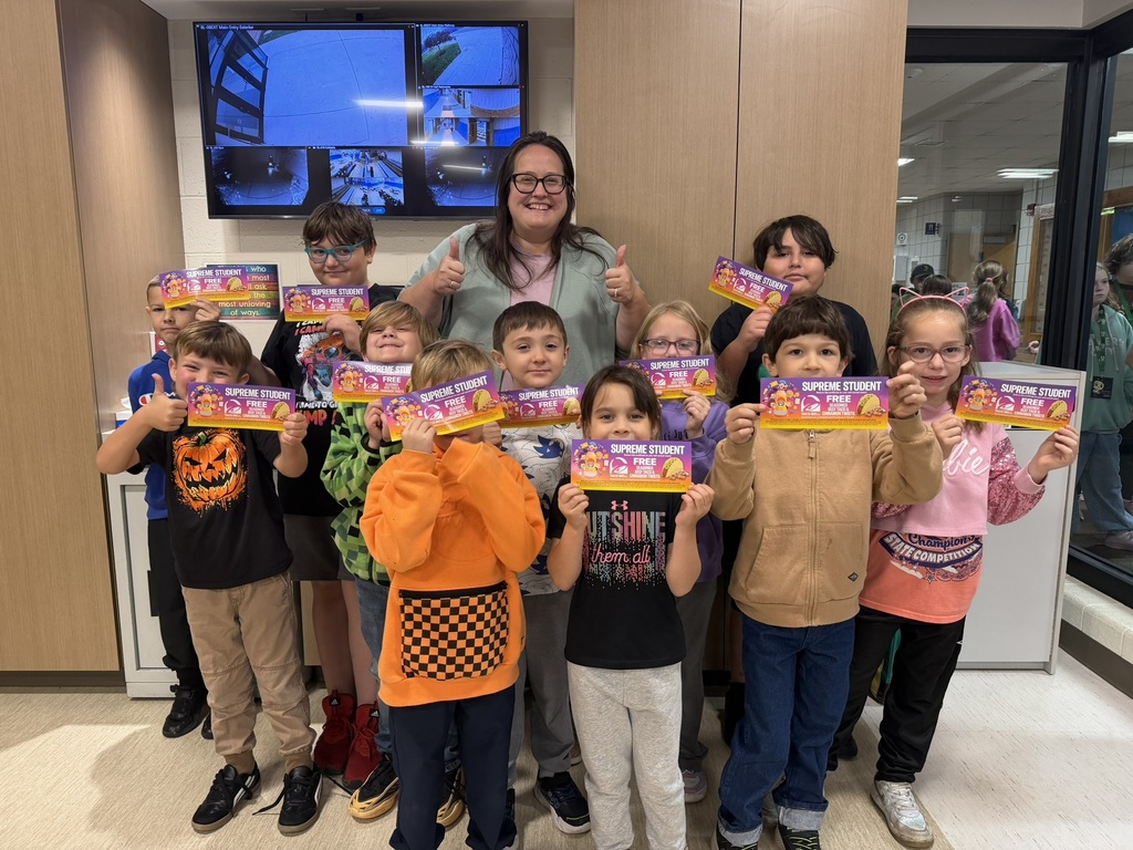 Elementary students with their think ticket winnings.