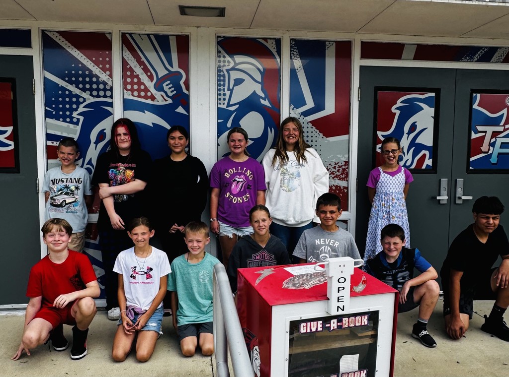 kids standing in front of school