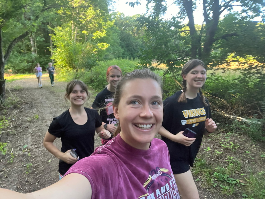 Athletes running on the new trail system