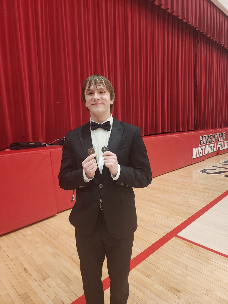 Ethan with both medals