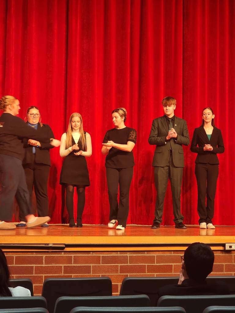 Jenna accepting medal