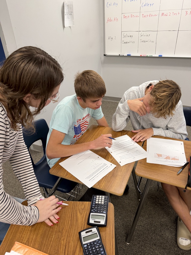 Students work to solve review questions.