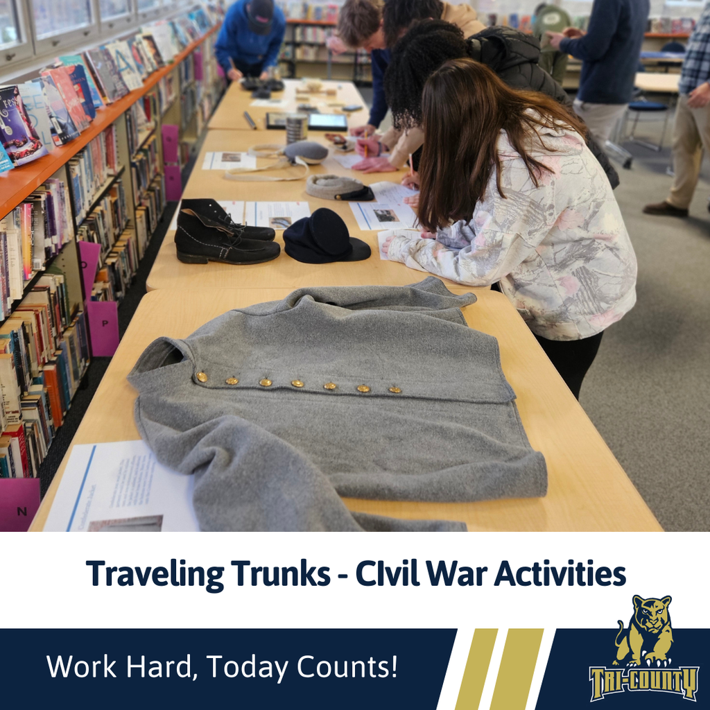 Students working on activities through exploration of civil war artificats provided by the traveling trunks program