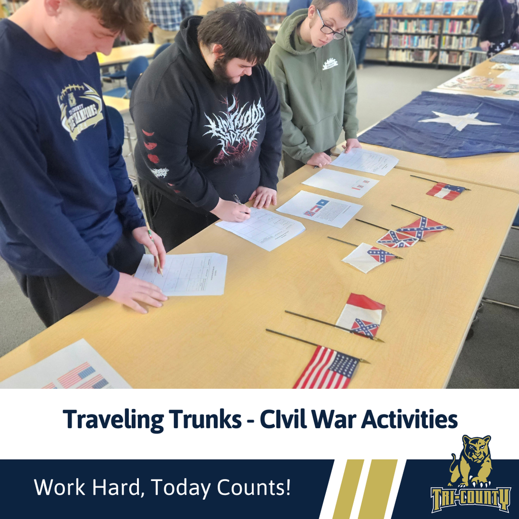 Students working on activities through exploration of civil war artificats provided by the traveling trunks program