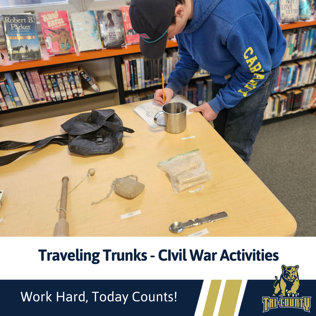 Students working on activities through exploration of civil war artificats provided by the traveling trunks program