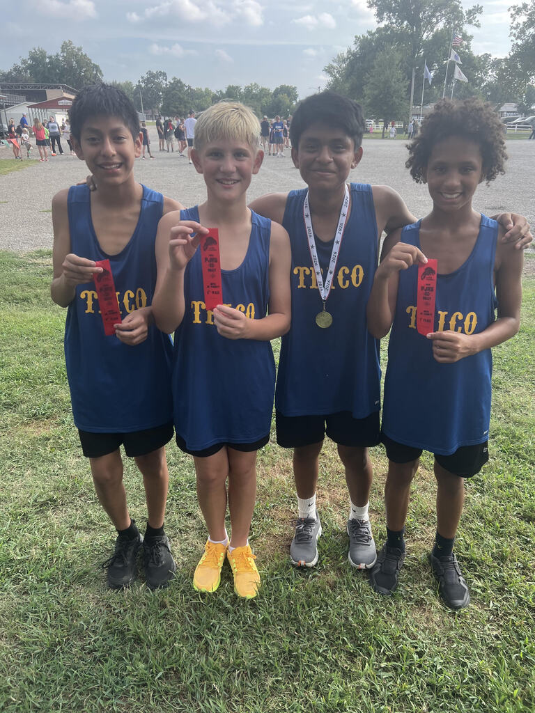 Cross Country runners with medals