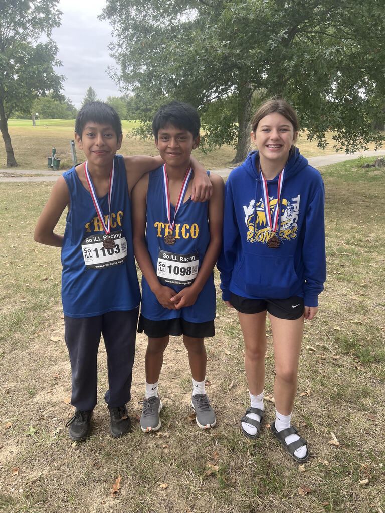 Cross Country runners with medals