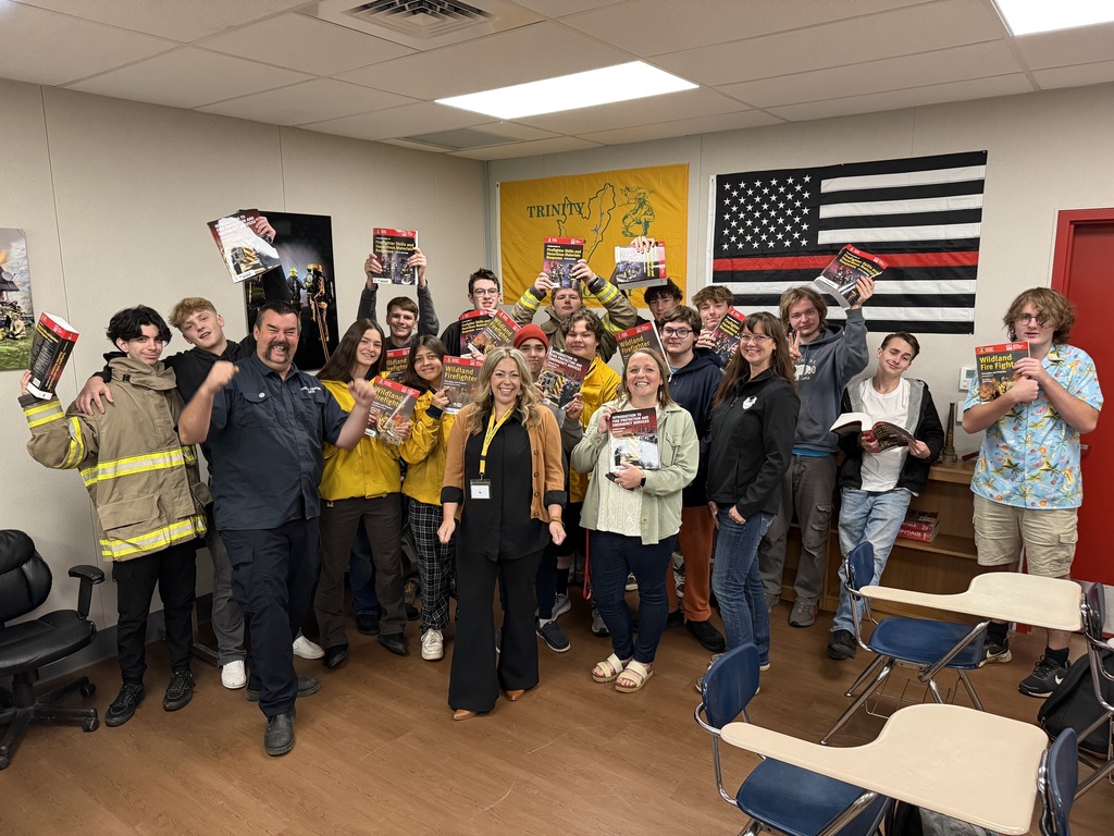 image of fire class receiving textbooks