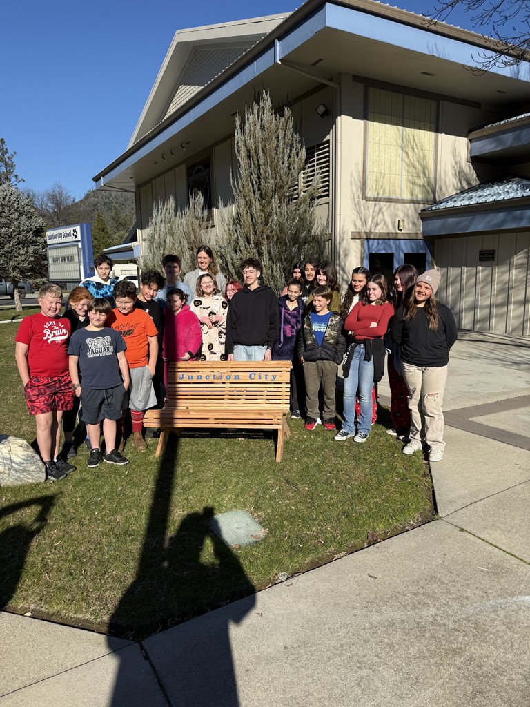 image of students with bench