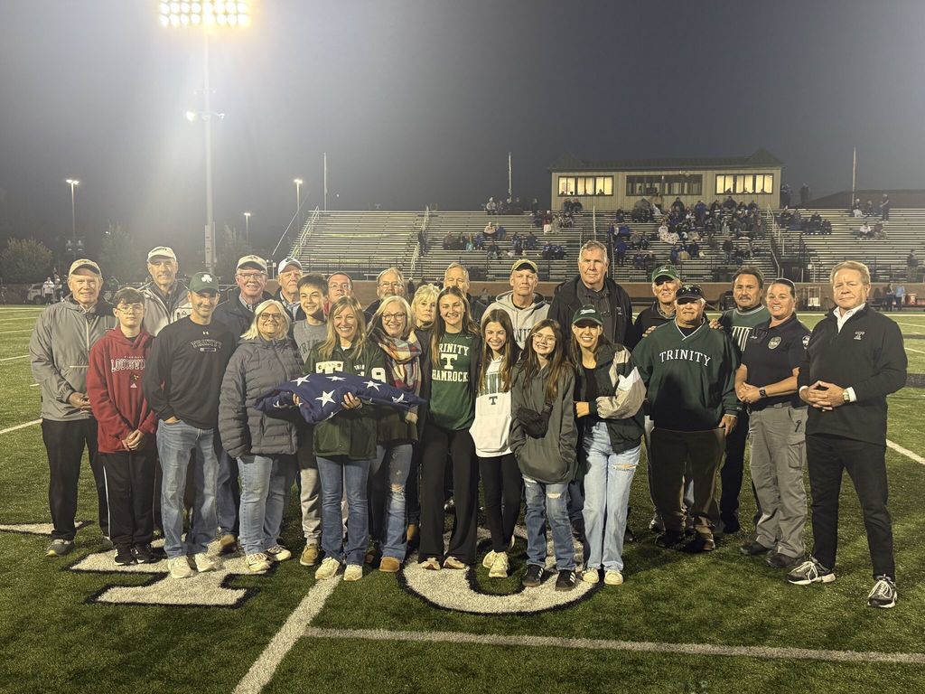 Coach Servino's family and classmates prior to the Trinity Football game