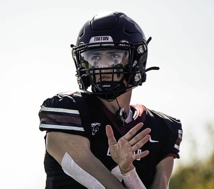 Pierce Petersohn throwing the football.