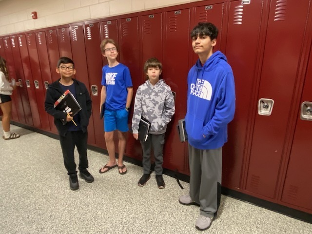 students at lockers