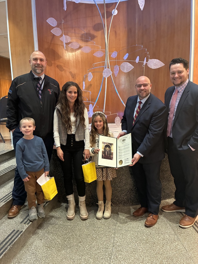 Picture of student and her family