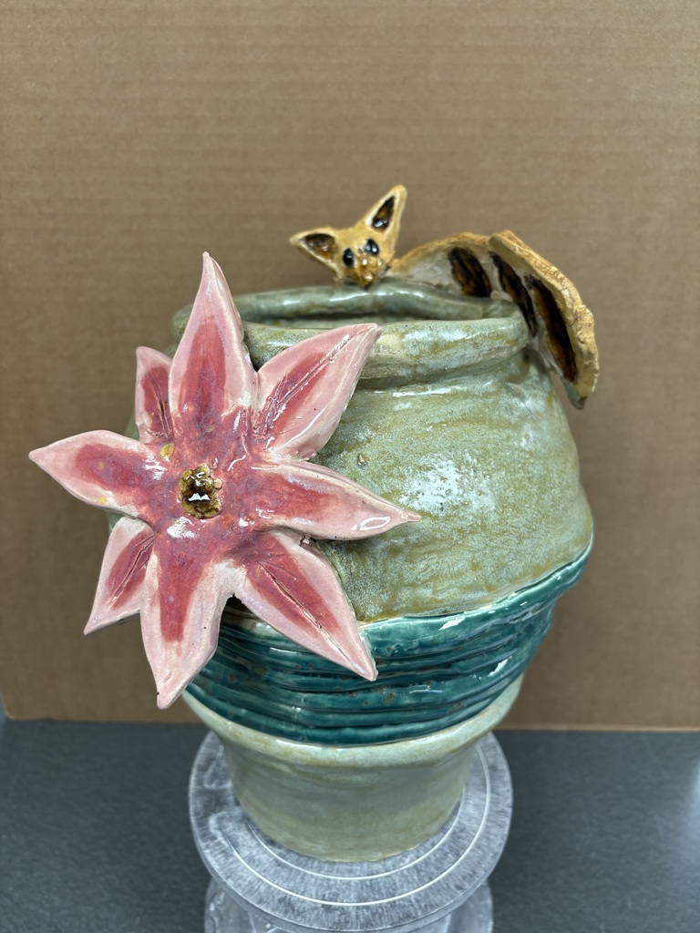 ceramic coil vase with flower