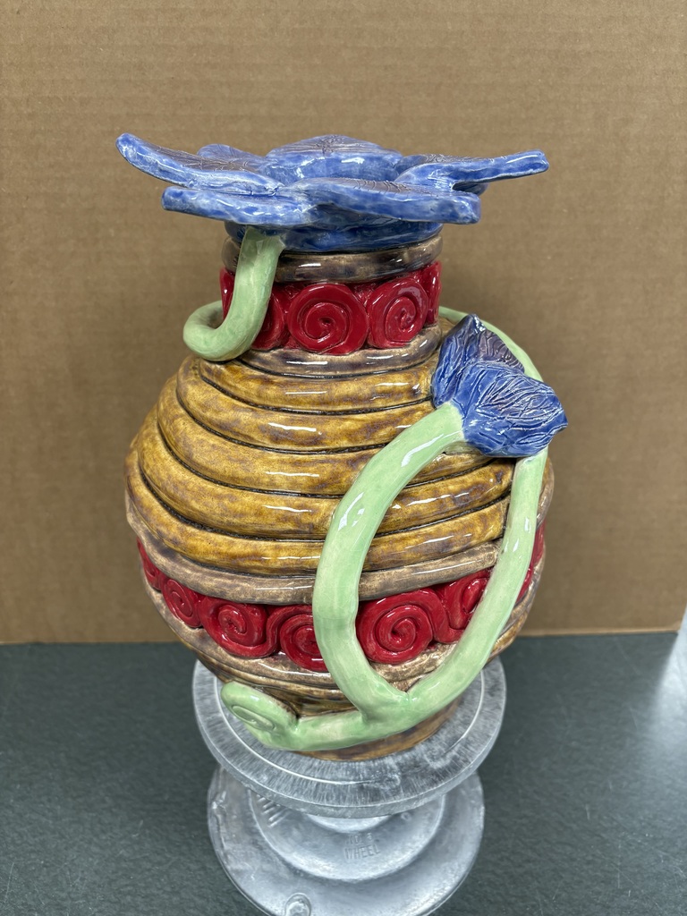 ceramic coil vase with flower vine