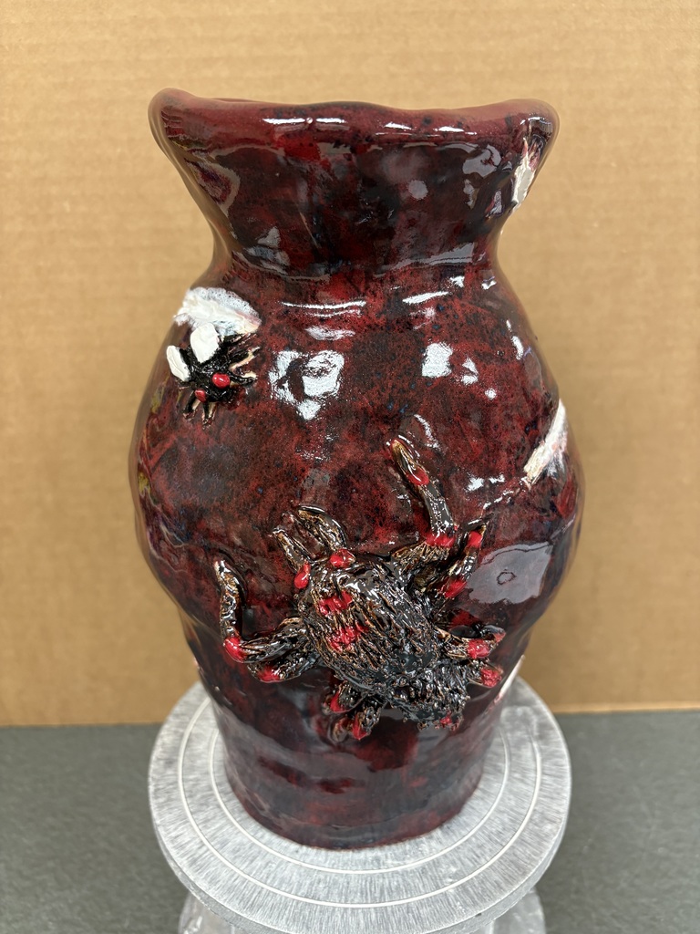 Ceramic vase with a  ceramic spider