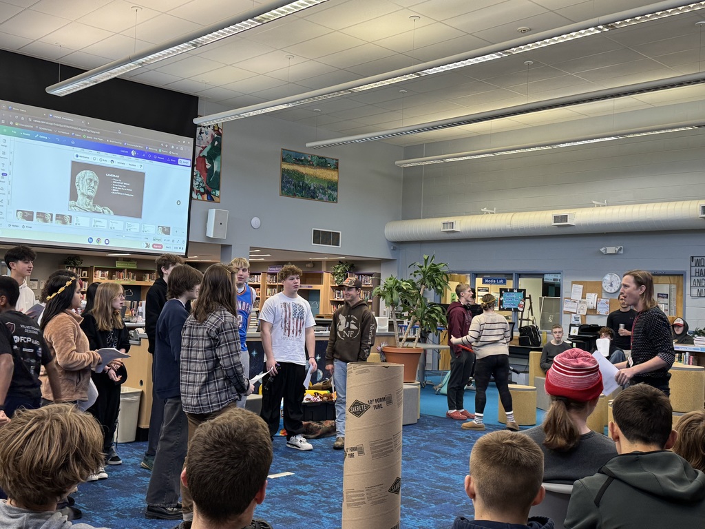 Students receiving instruction during a theater workshop