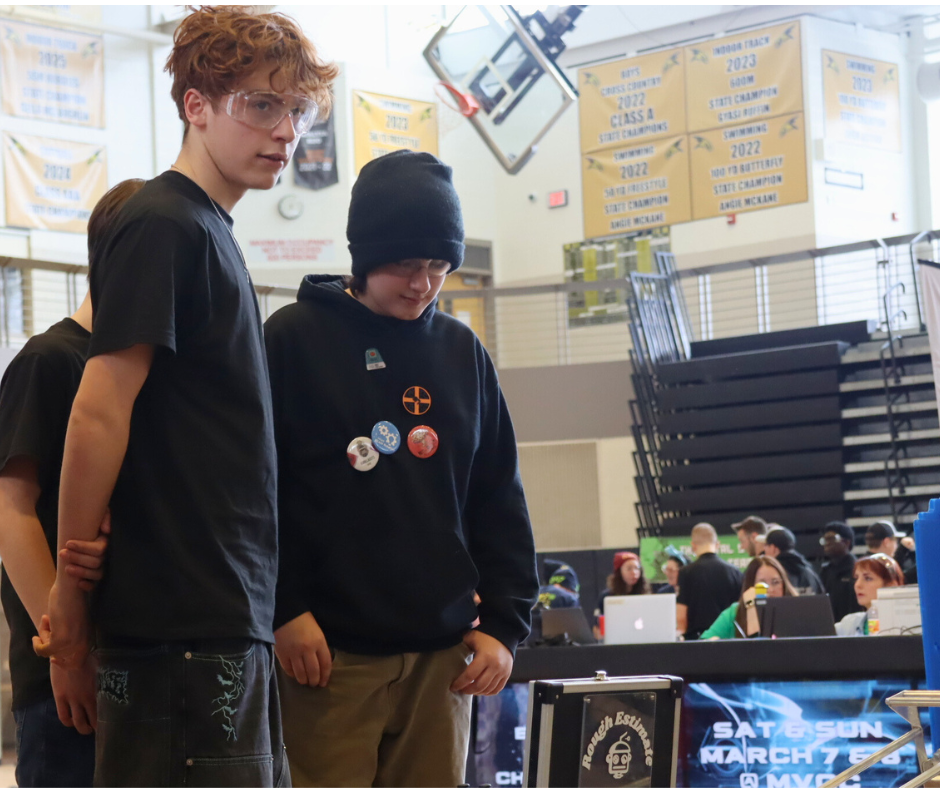Students watching robotics competition