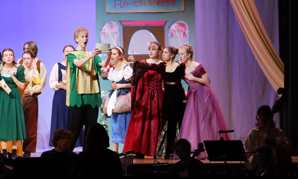 Final dress rehearsal, students in costume on stage