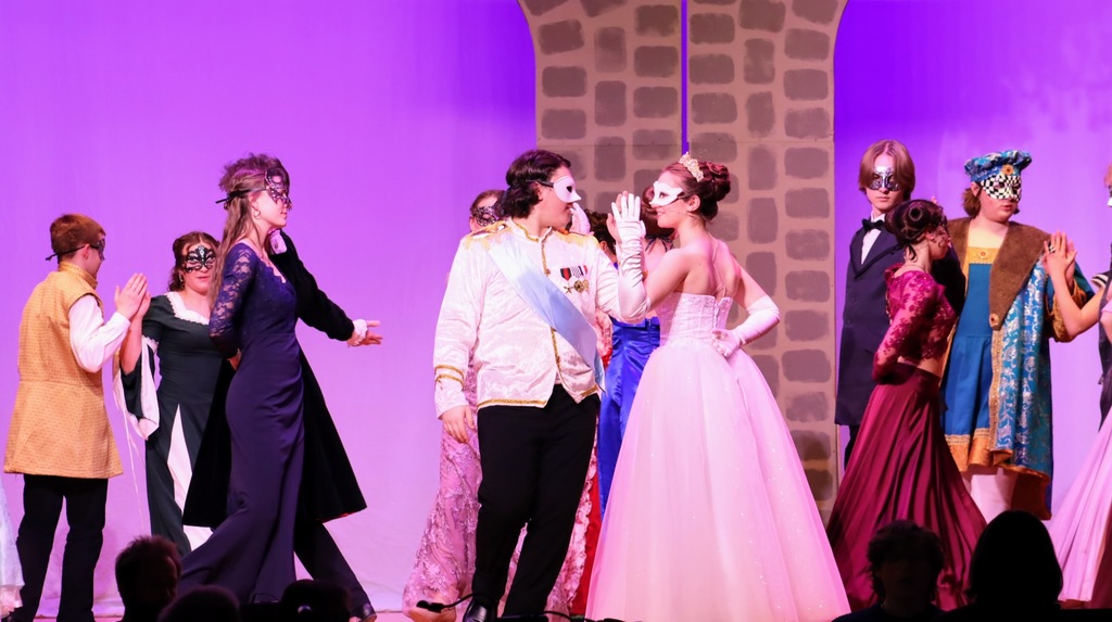 Cinderella in a white dress, dancing with the prince