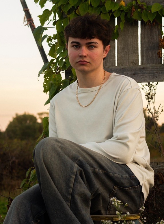 Picture of a student in a white shirt