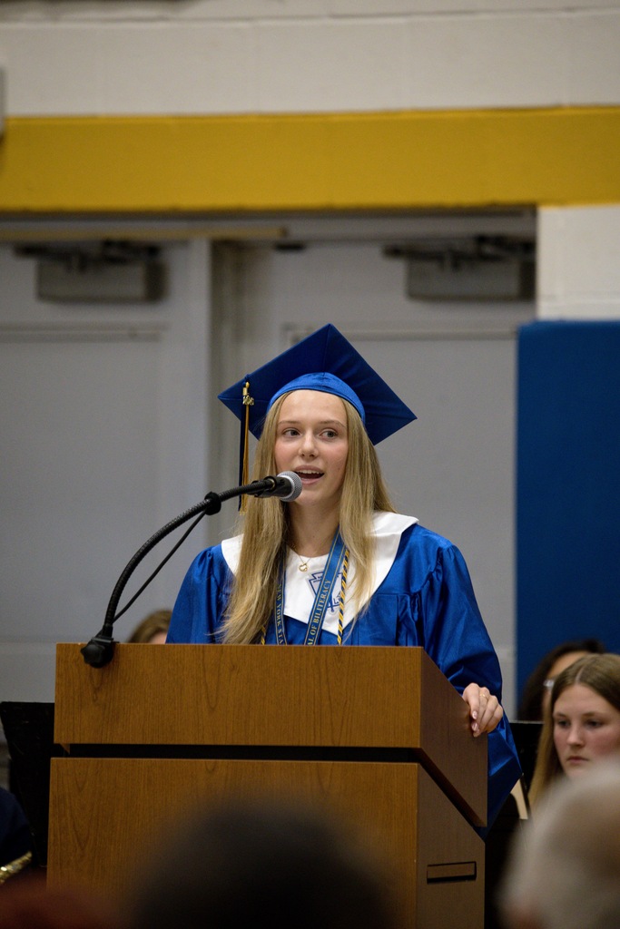 Student speaking at podium
