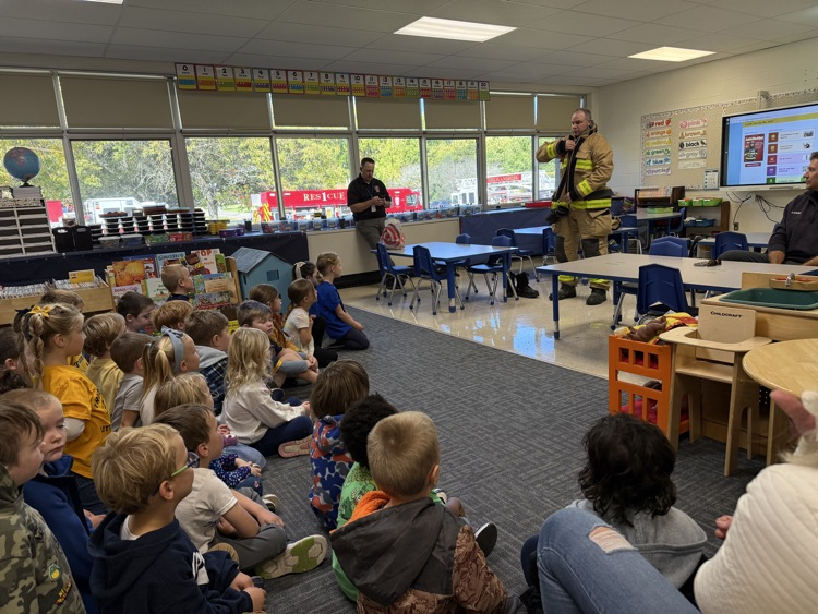 in a classroom learning about fire safety