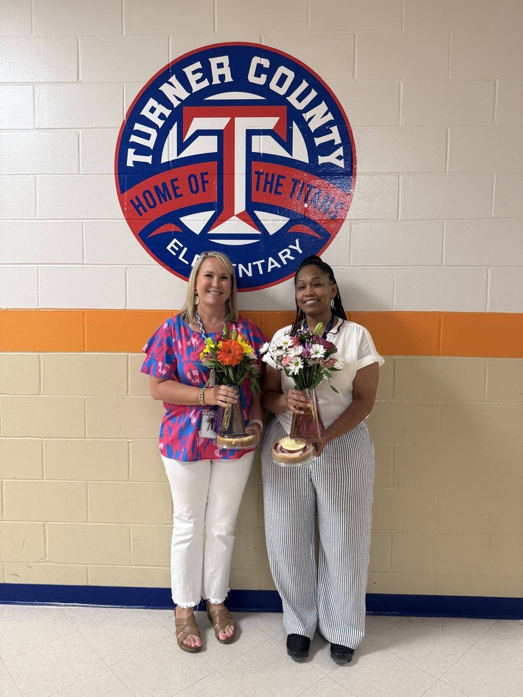 teachers with flowers