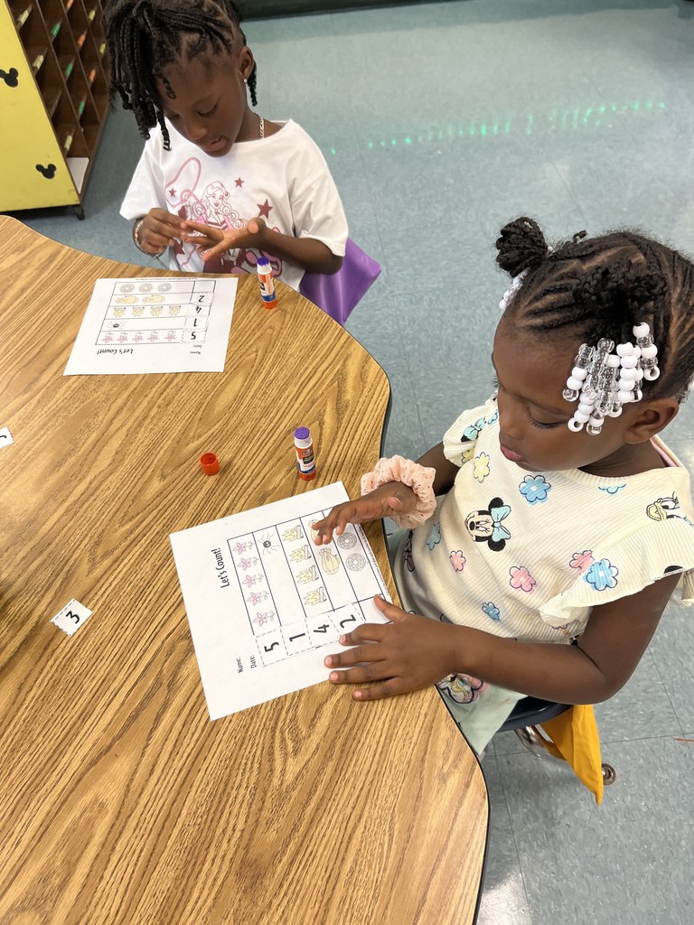 students with completed classwork, desks