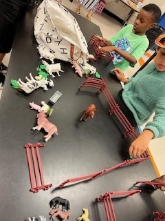 students with farm play