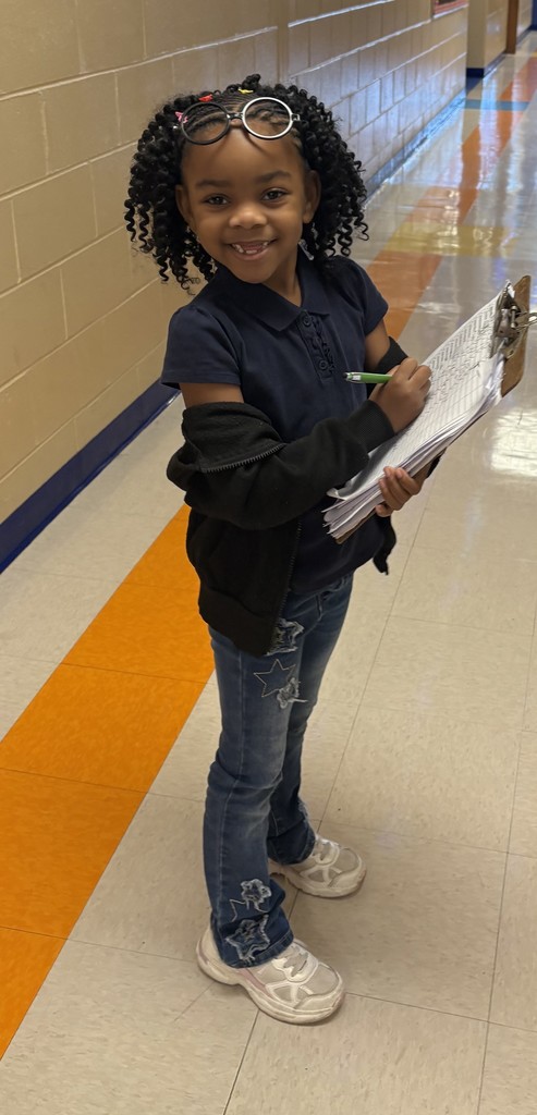 student, glasses, clipboard, pen, hallway