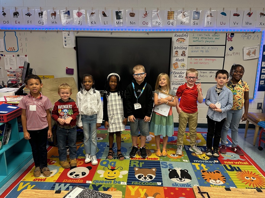 students, rug with ABC animals, ABC border, anchor charts