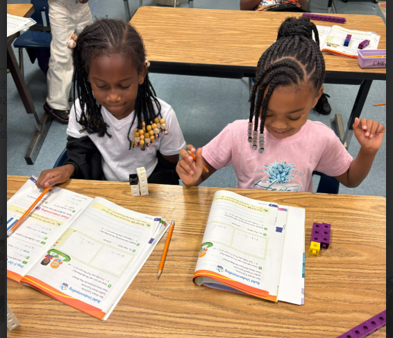 students, workbooks, desks