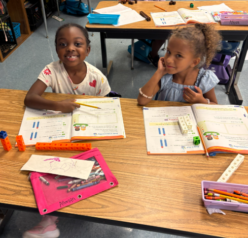 students, pencils, workbooks, desks