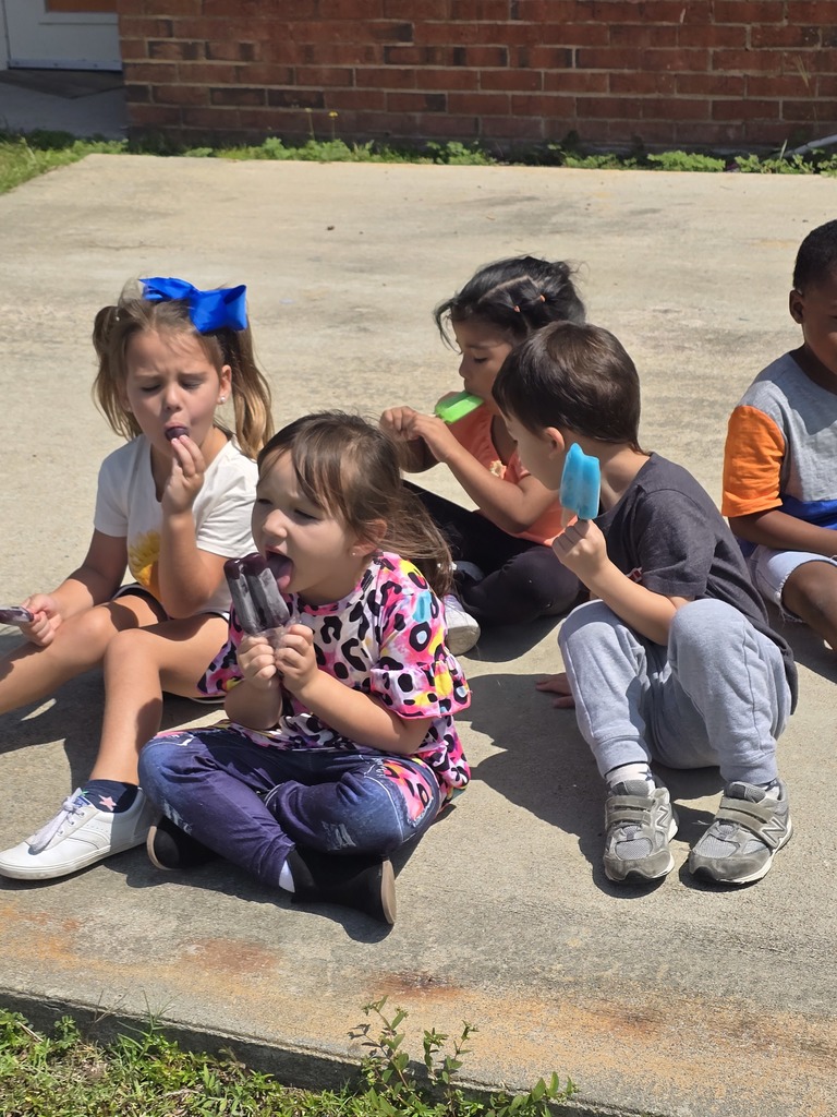 students, building, popsicle , sidewalk