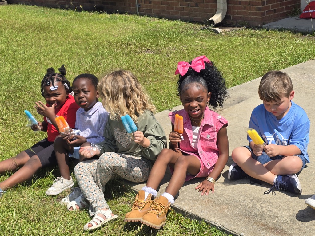 students, building, popsicle , sidewalk, grass