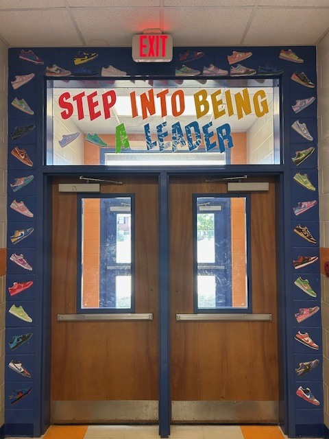 two doors with windows. rectangle handles to open. Nike dunks colored by students
