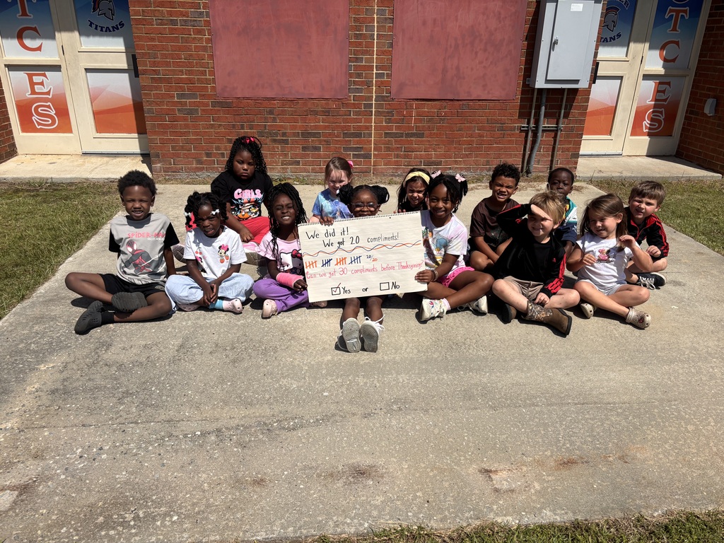 students, popsicles, brick building, concrete, sign